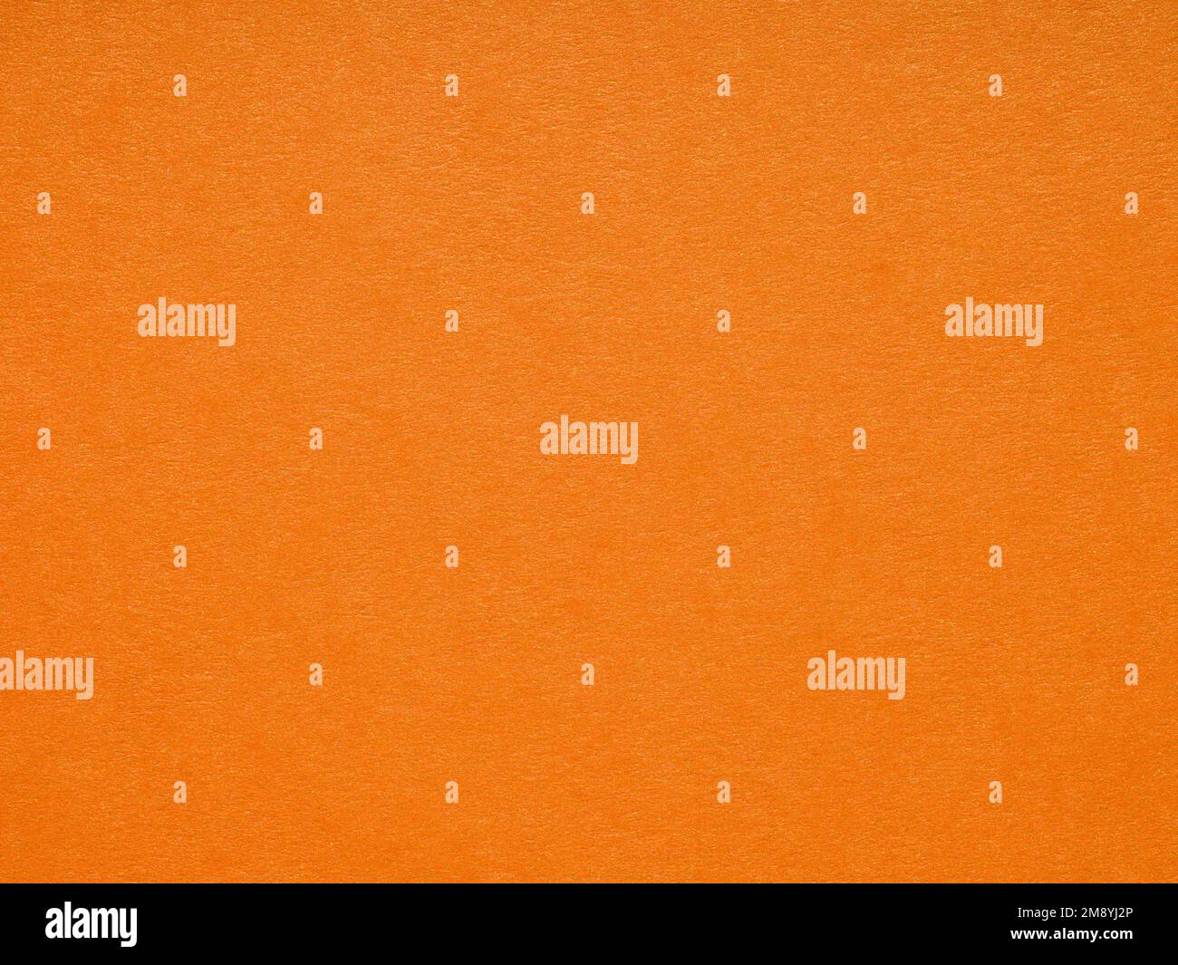 Metallized orange soft matt paper background. Blank page pattern of designer cardboard. Texture for making winter season Christmas festival card sheet Stock Photo