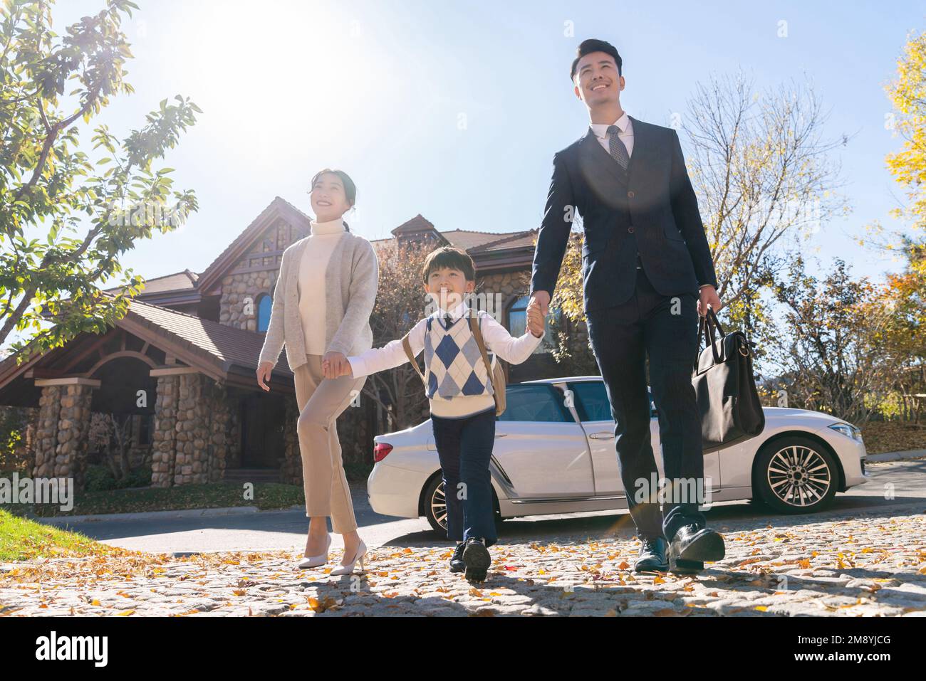 Chinese parents pick up their children from school hi-res stock ...