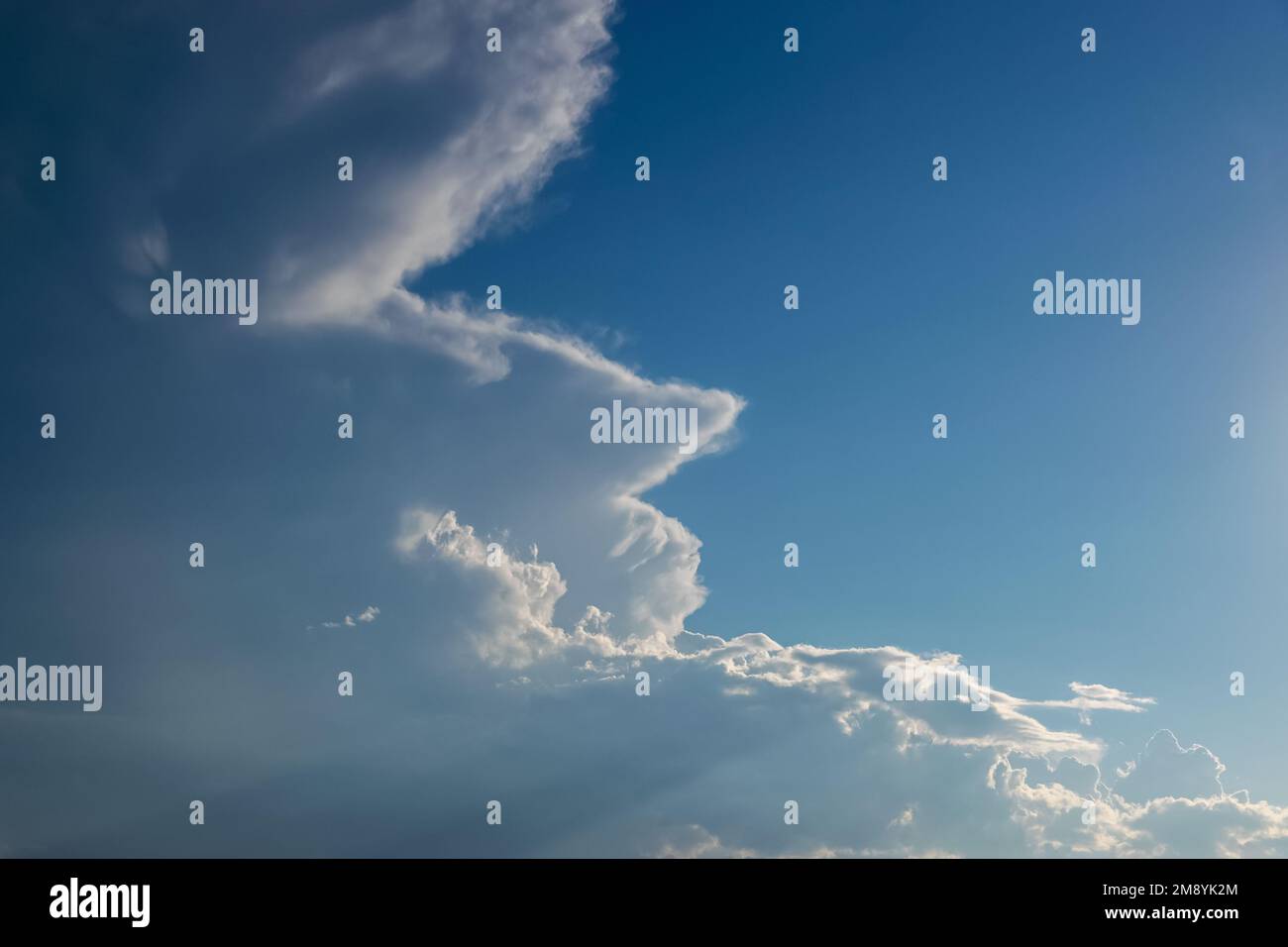 Dramatic blue sky with white clouds Stock Photo - Alamy