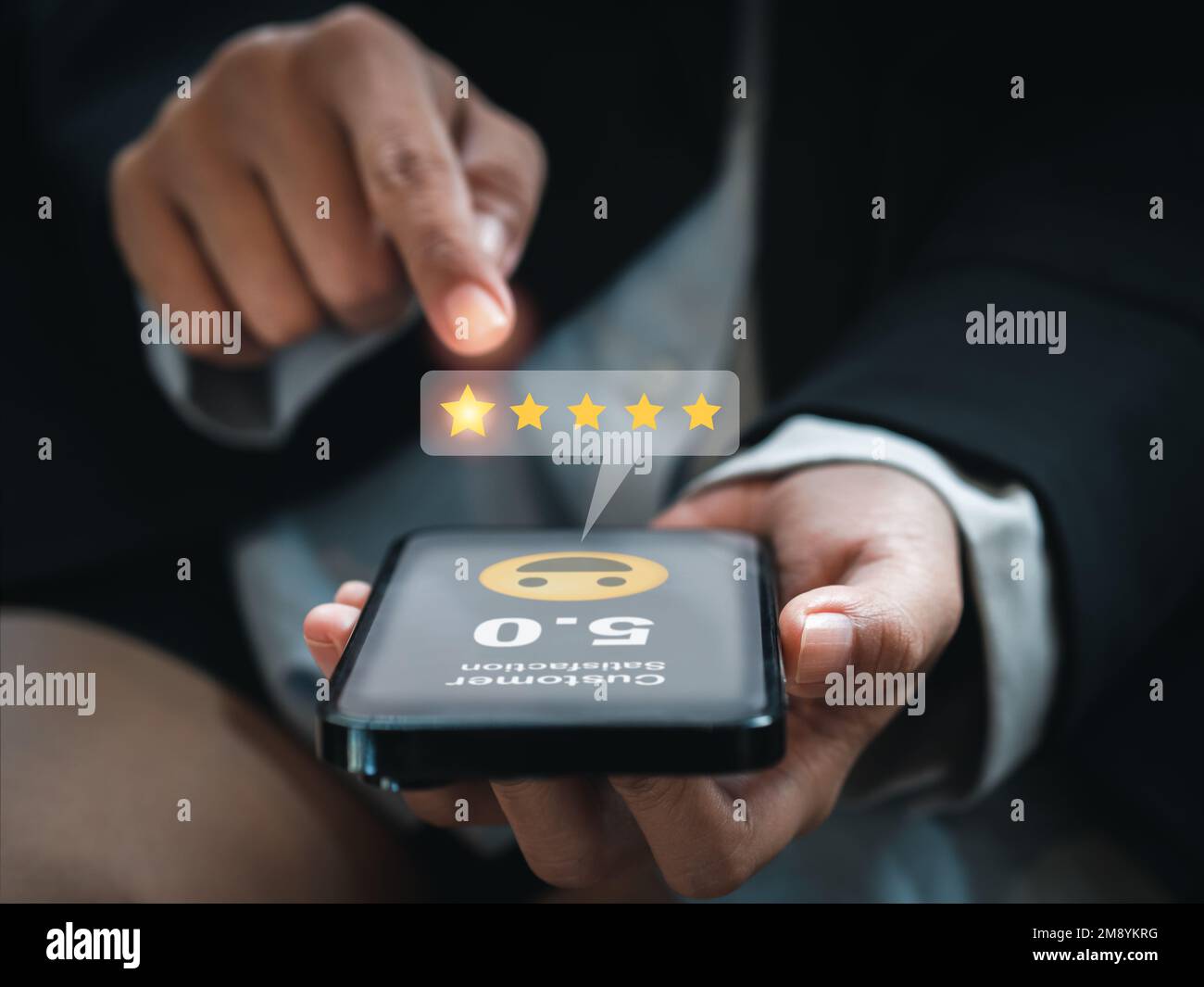 Customer review, satisfaction, feedback, survey concepts. The User giving 5 stars point rating with smile face icon to service experience, business ra Stock Photo
