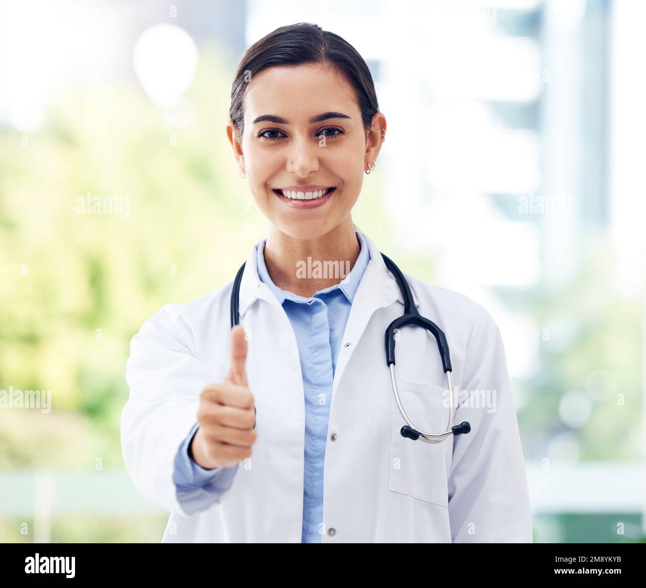 Thumbs up young doctor on hi-res stock photography and images - Alamy