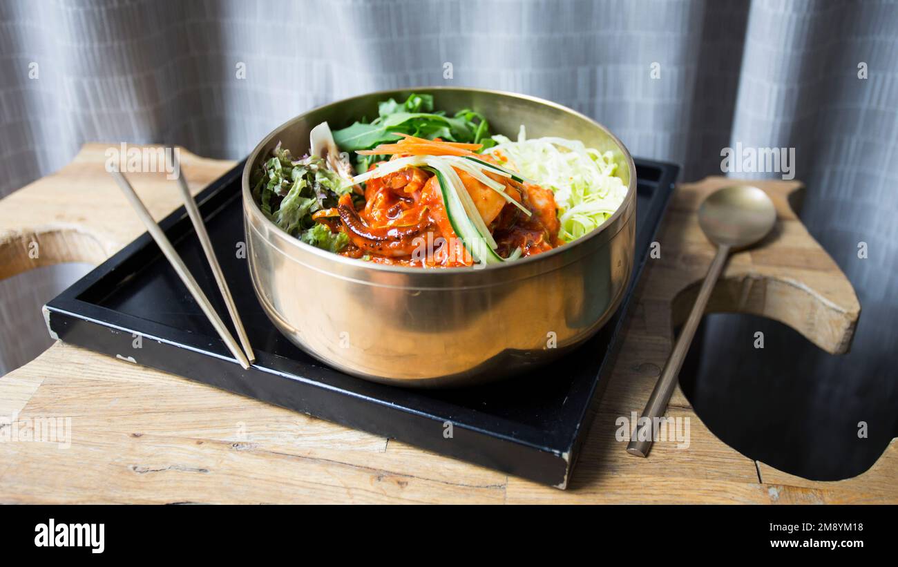 Tofu salad with kimchi and vegetables. Traditional asian recipe Stock