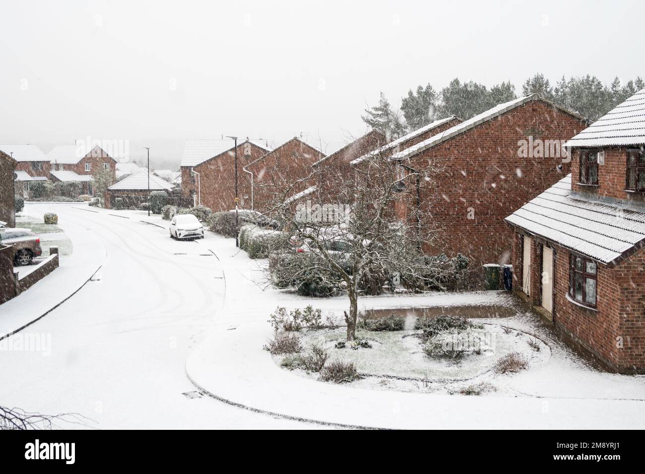UK Weather 16th January 2023 Snow falling on a residential street in Washington, north east England, UK Stock Photo
