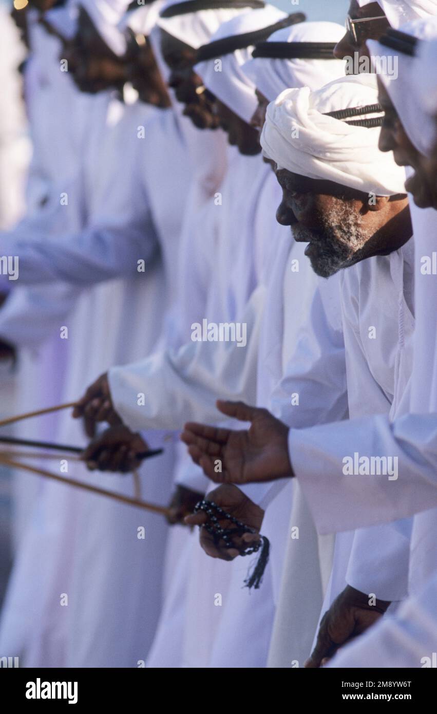Bahrain, men in traditional dance, as can be seen at many of the countries festivities. Stock Photo