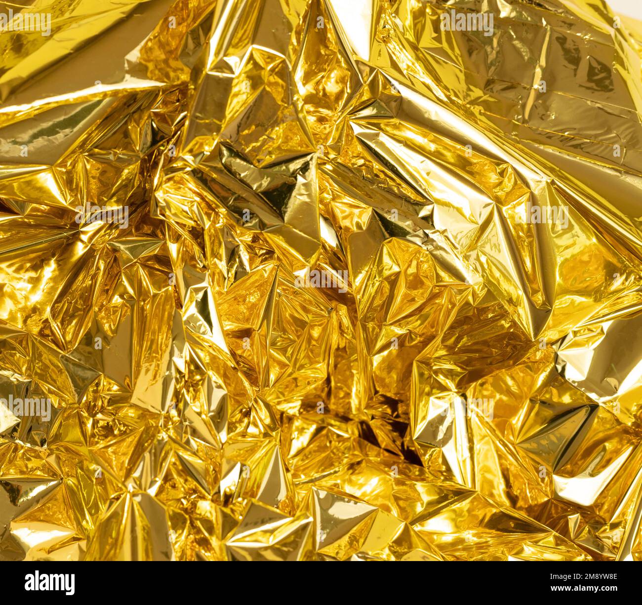 full frame creased gold foil background Stock Photo