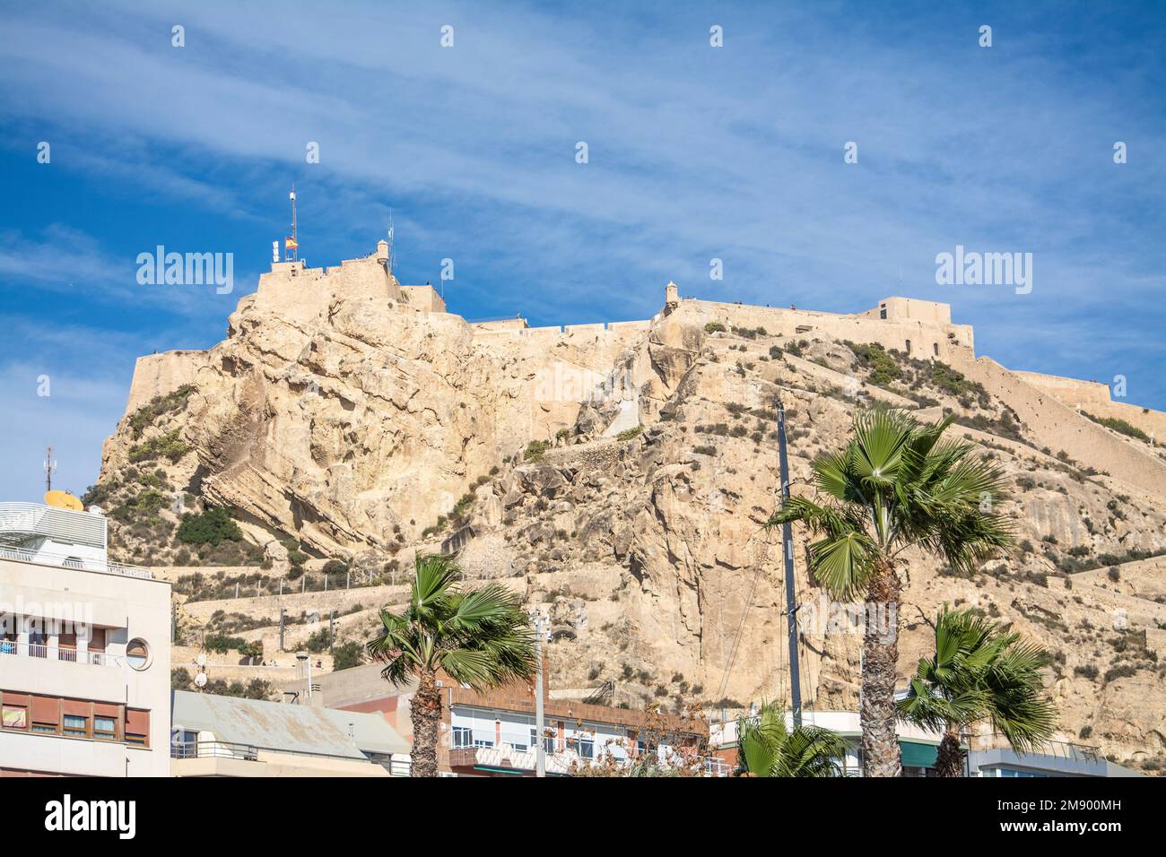 Cliff top castle in Alicante viewed from the marina Stock Photo