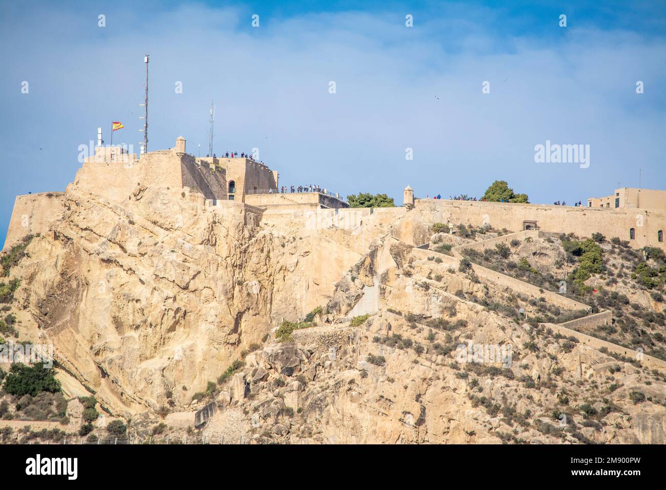 Cliff top castle in Alicante viewed from the marina Stock Photo