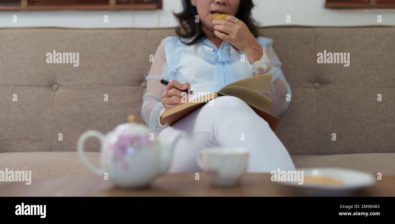 Senior woman good healthy at home. Exercise and healthy diet concept Stock Photo