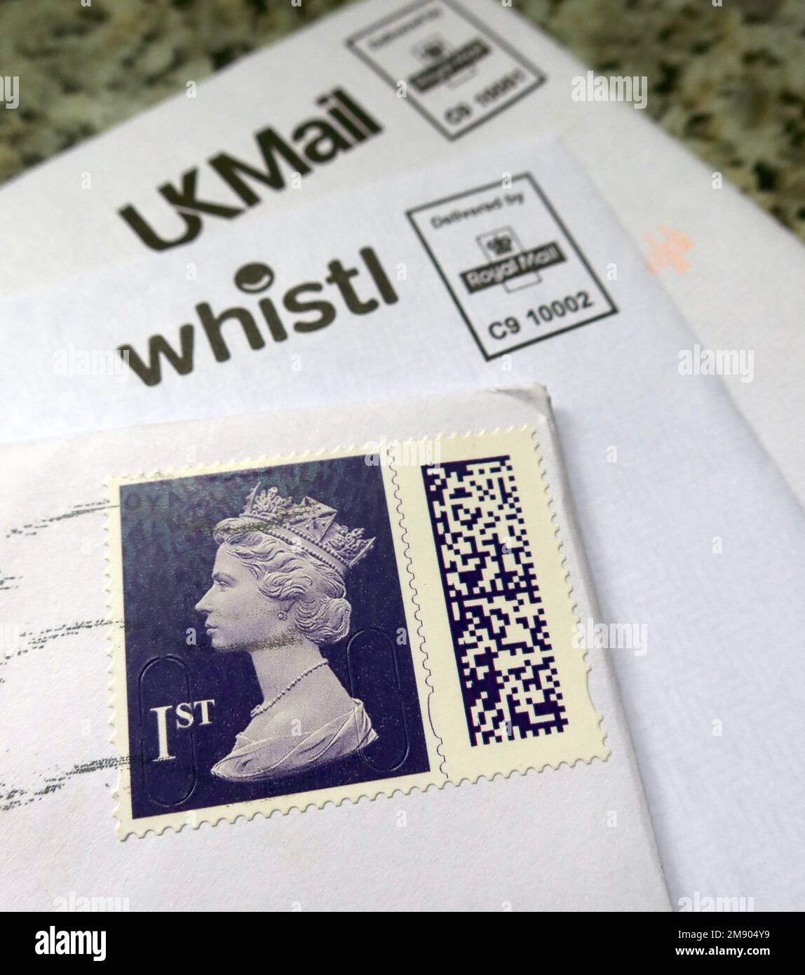 QR / Barcoded British 1st class stamp, on franked letter envelope, with
