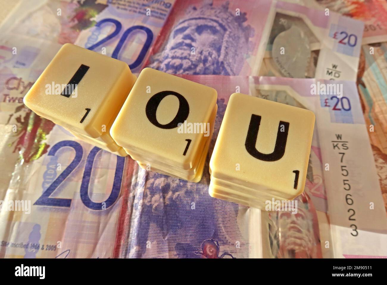 IOU, I Owe You, letters on a number of Scottish Sterling notes, borrowing and lending from friends or colleagues Stock Photo