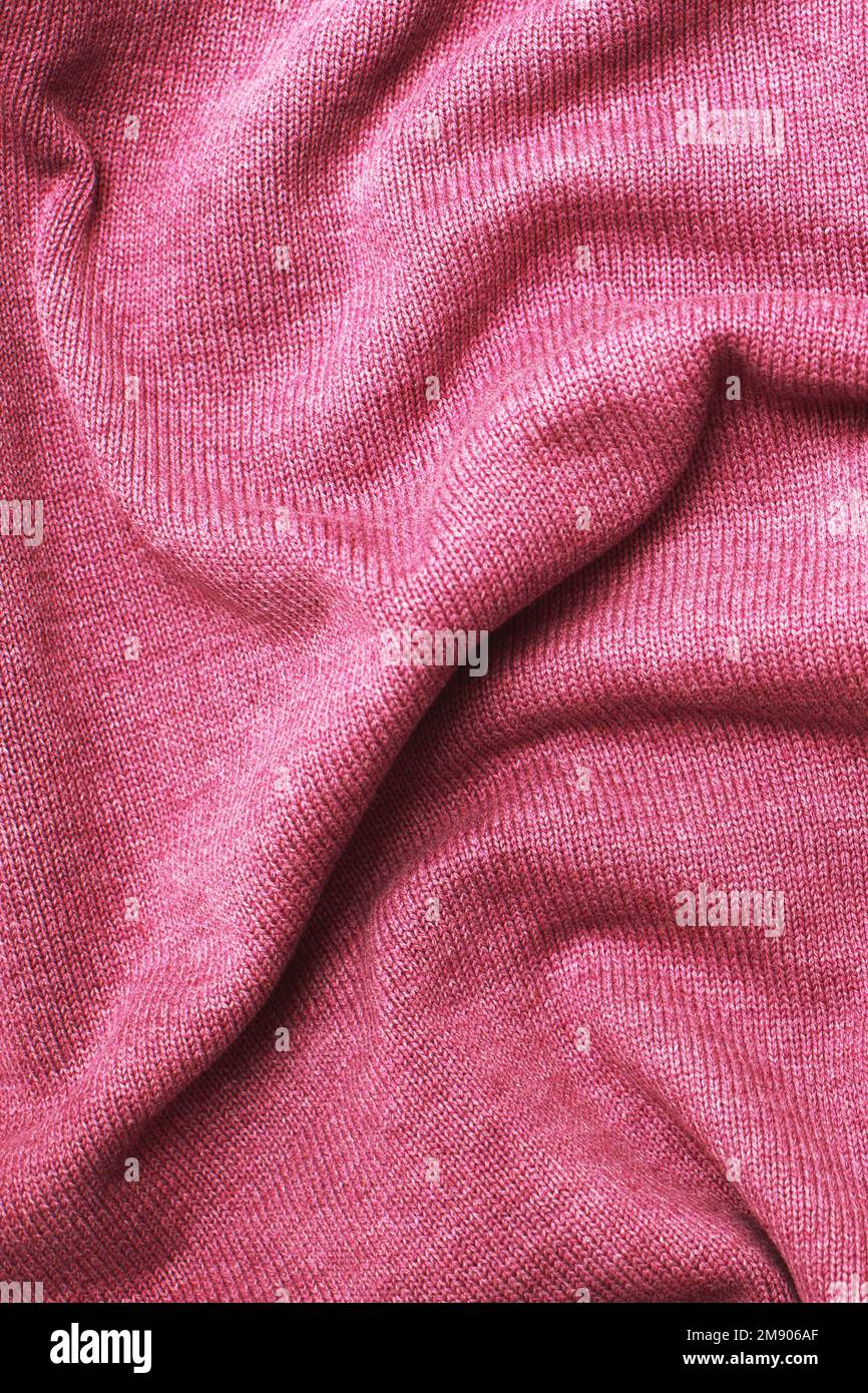 burgundy viva magenta wrinkled plush fabric background texture, soft material pattern Stock