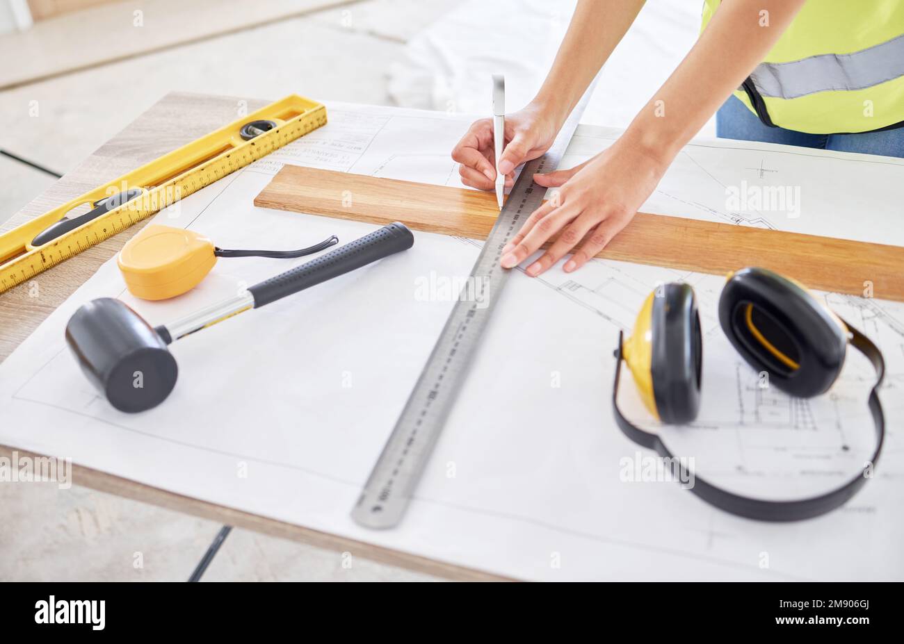 Adding a homely touch. an unrecognisable contractor standing alone ...