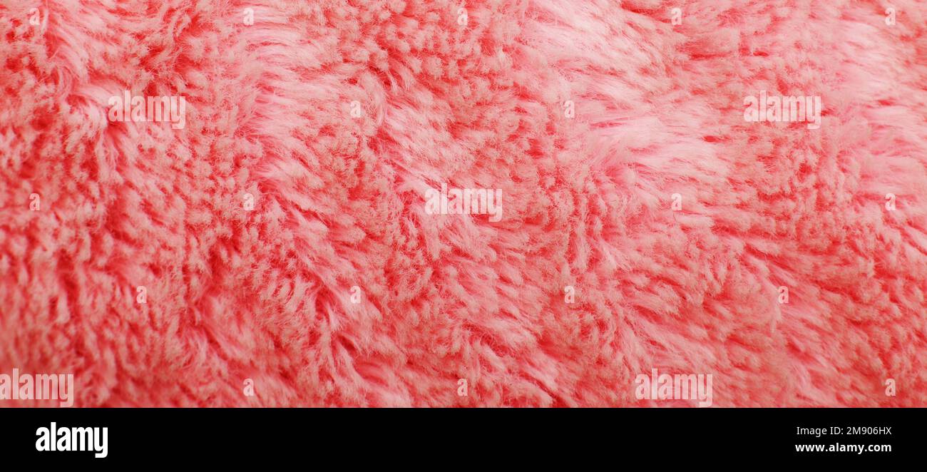 pink fluffy textile texture. Nappy hairy background closeup Stock Photo
