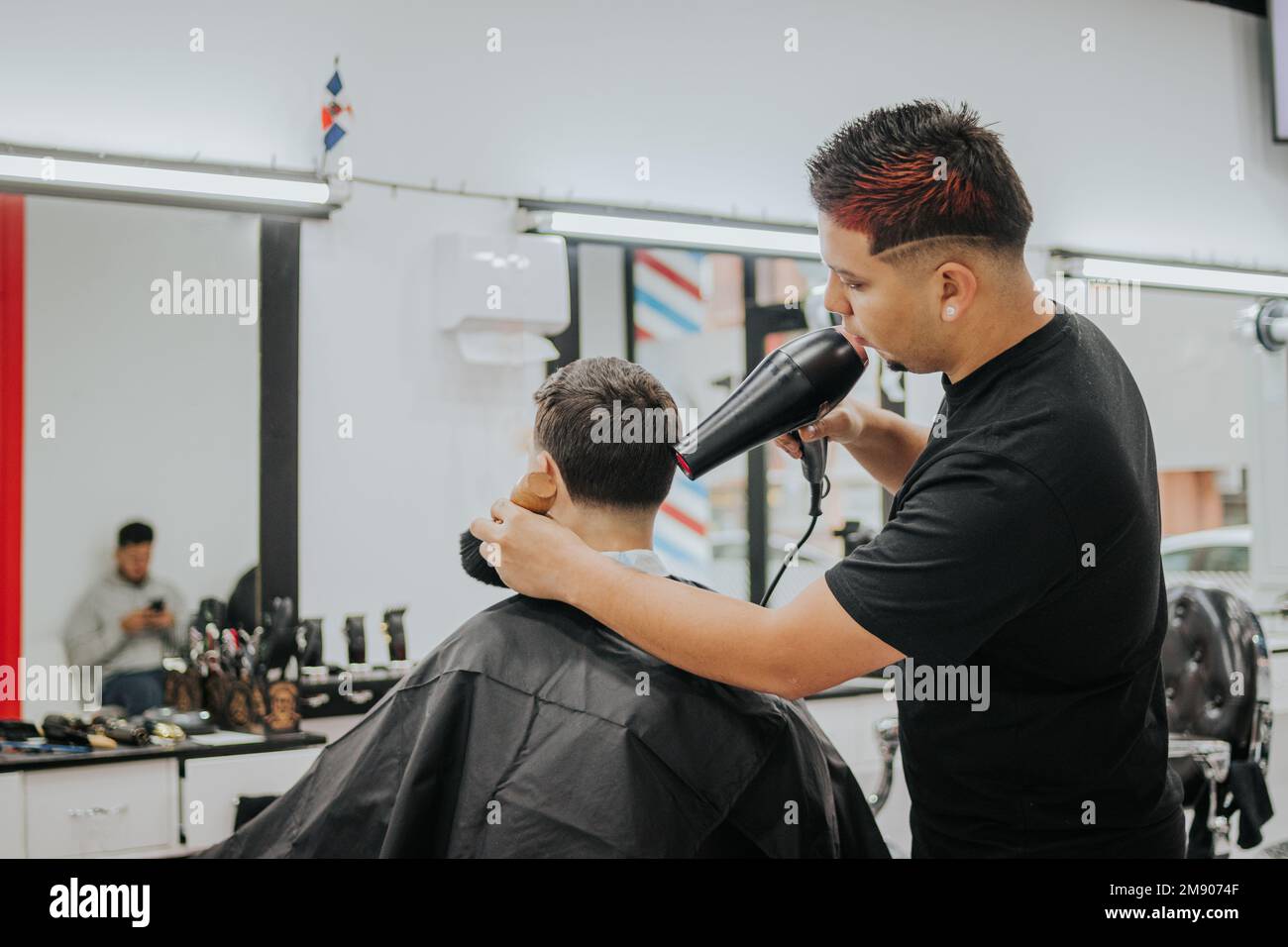 Man using hair dryer hi-res stock photography and images - Alamy
