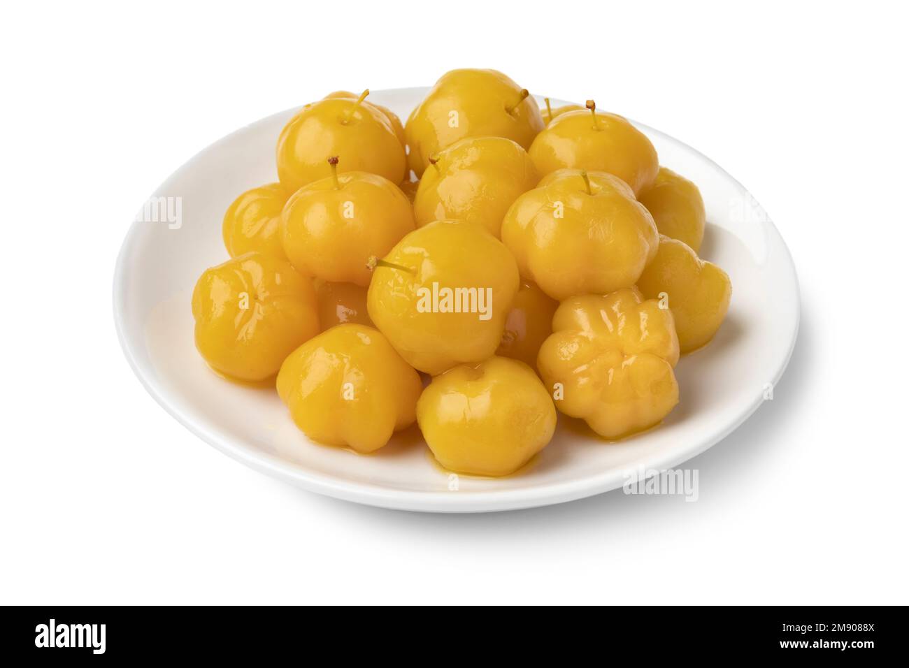 Dish with preserved star gooseberry, Mayom, isolated on white background Stock Photo