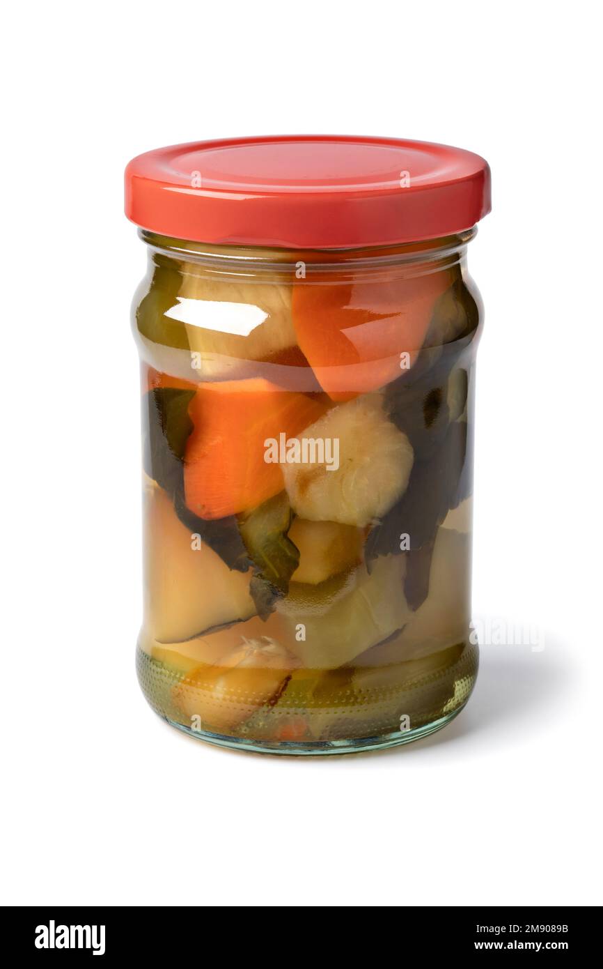 Glass jar with Asian mixed pickled ginger and vegetables close up isolated on white background Stock Photo