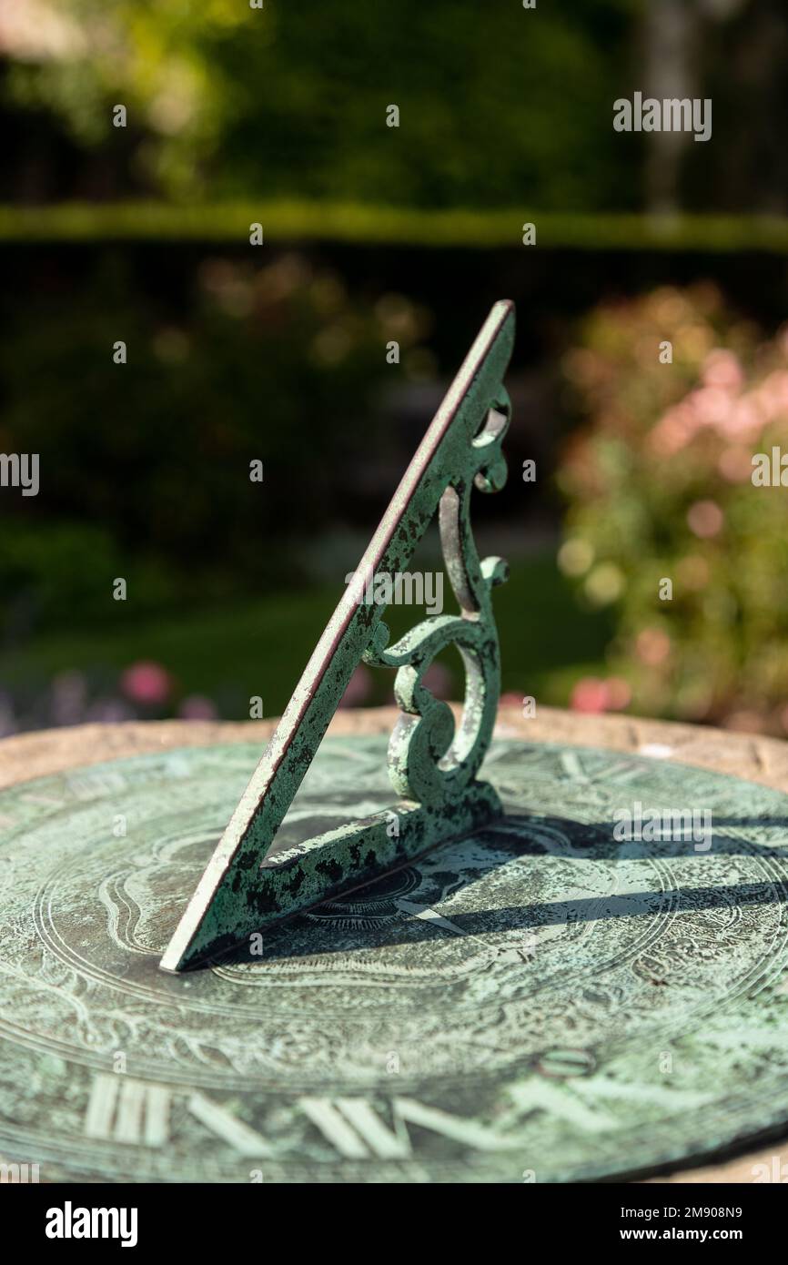 Old fashioned bronze sundial Stock Photo
