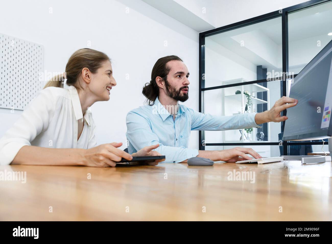 Professional development programers programming game software or developing code for shopping online financial data security system network working at Stock Photo