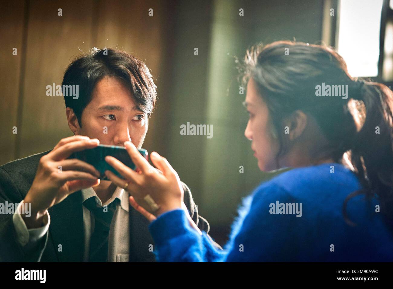 TANG WEI and PARK HAE-IL in DECISION TO LEAVE (2022) -Original title: HEOJIL KYOLSHIM-, directed by PARK CHAN-WOOK. Credit: Moho Films / CJ Entertainment / Album Stock Photo