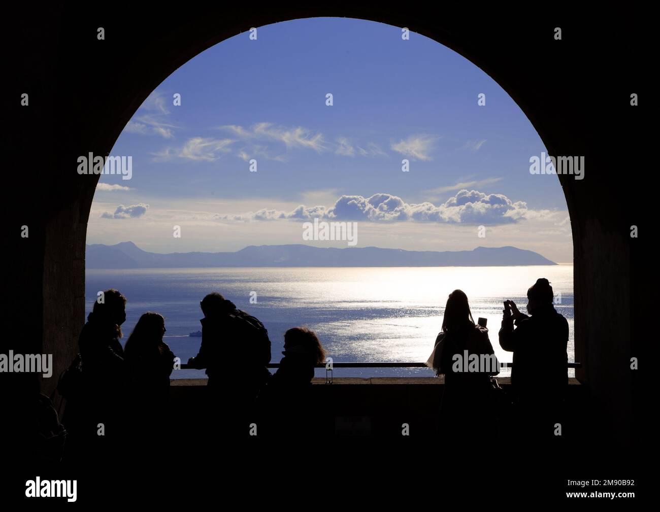 Silhouette of people with sea background Stock Photo - Alamy
