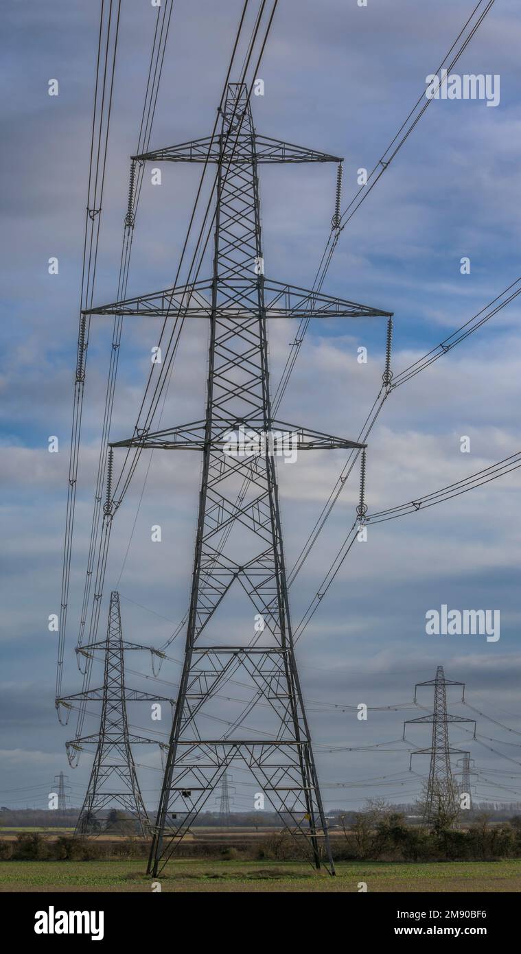 Lincolnshire, England UK - Electricity pylons running across farmland in Lincolnshire Stock Photo