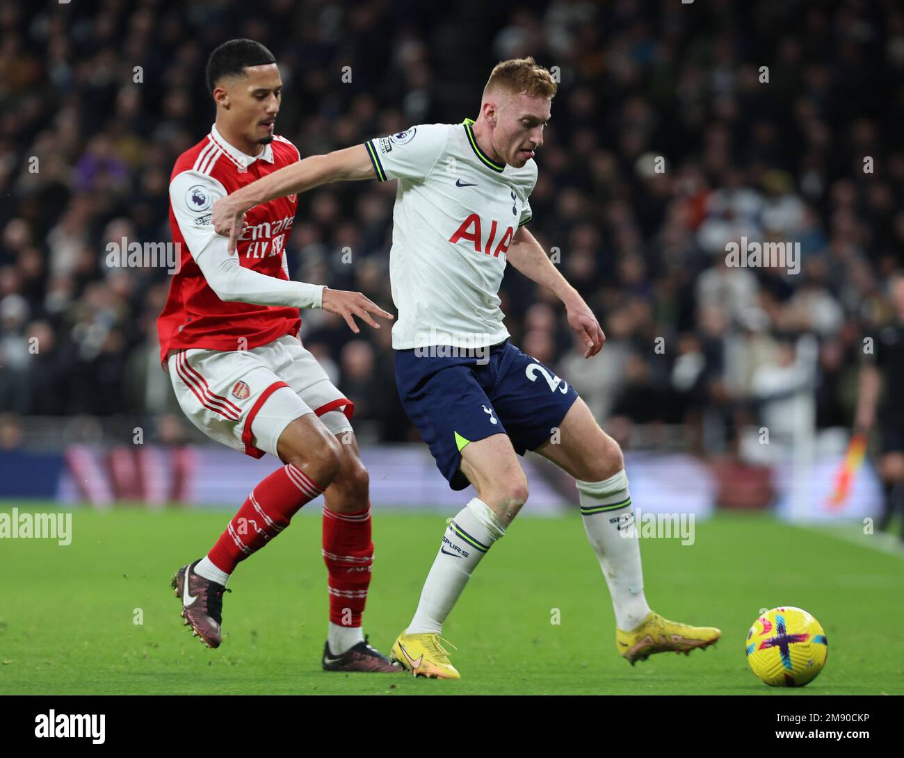 L-R Tottenham Hotspur's Dejan Kulusevski (on loan from Juventus) and William Saliba of Arsenal during the English Premier League soccer match between Stock Photo