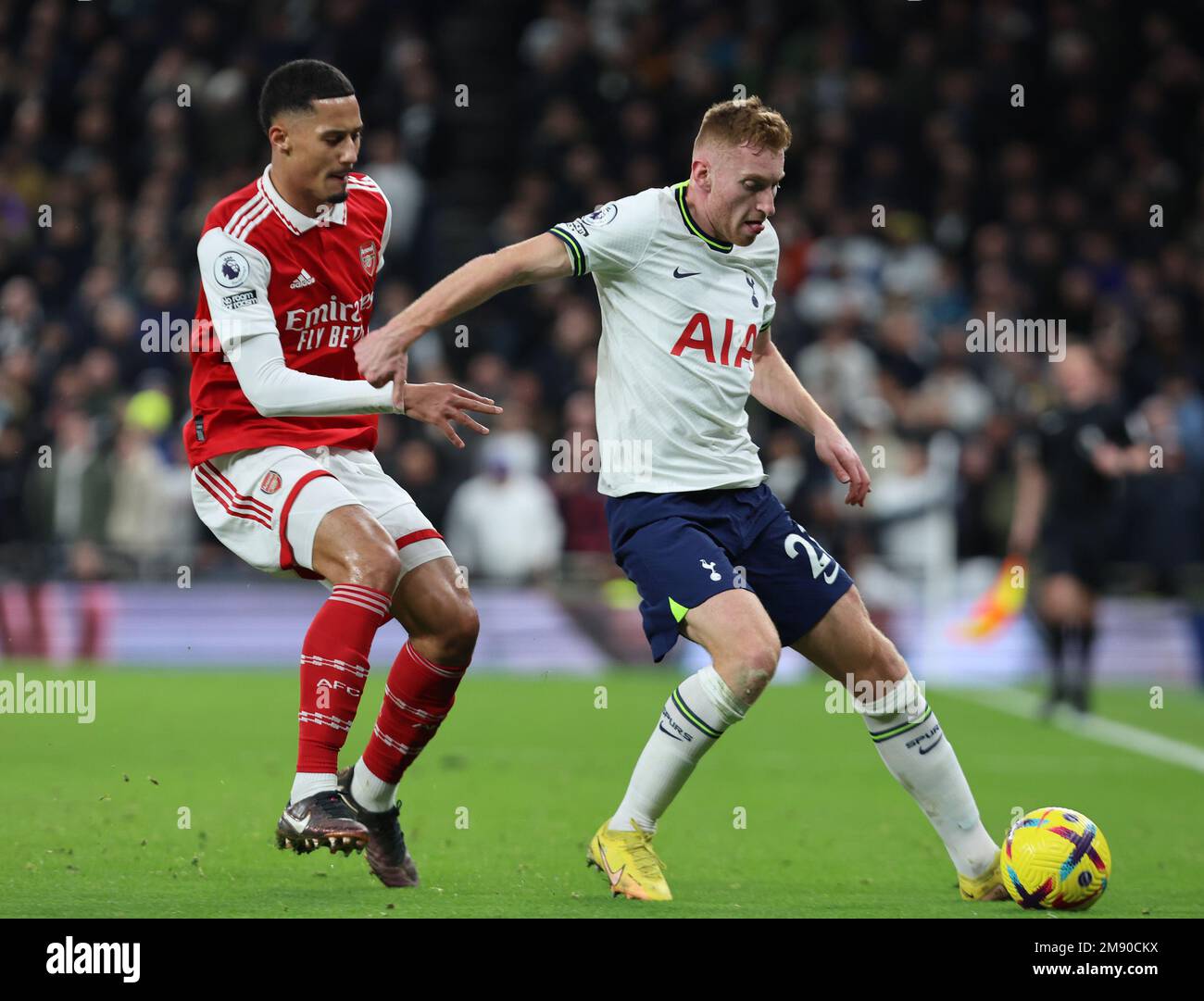 L-R Tottenham Hotspur's Dejan Kulusevski (on loan from Juventus) and William Saliba of Arsenal during the English Premier League soccer match between Stock Photo
