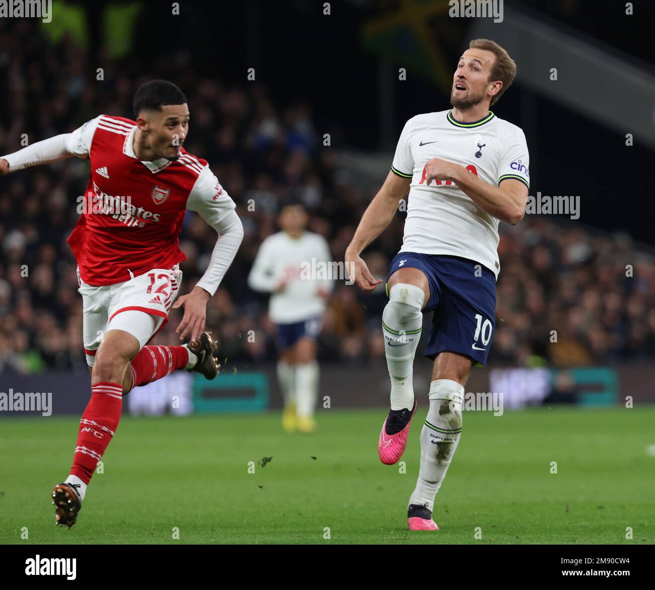 L-R William Saliba of Arsenal and Tottenham Hotspur's Harry Kane during the English Premier League soccer match between Tottenham Hotspur and Arsenala Stock Photo
