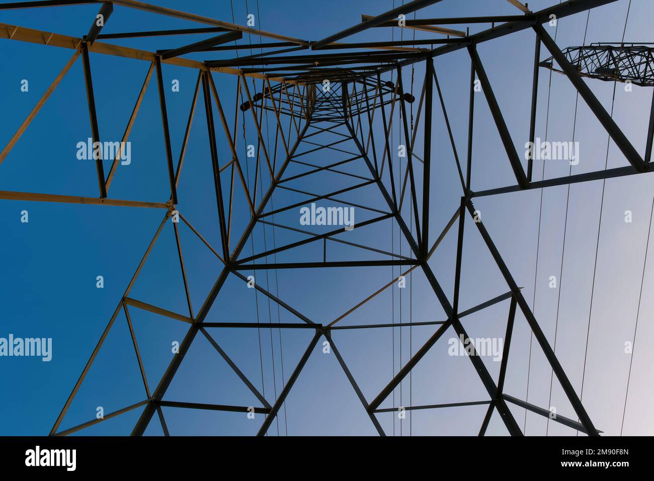 Looking up inside a PG&E electric transmission tower in the early