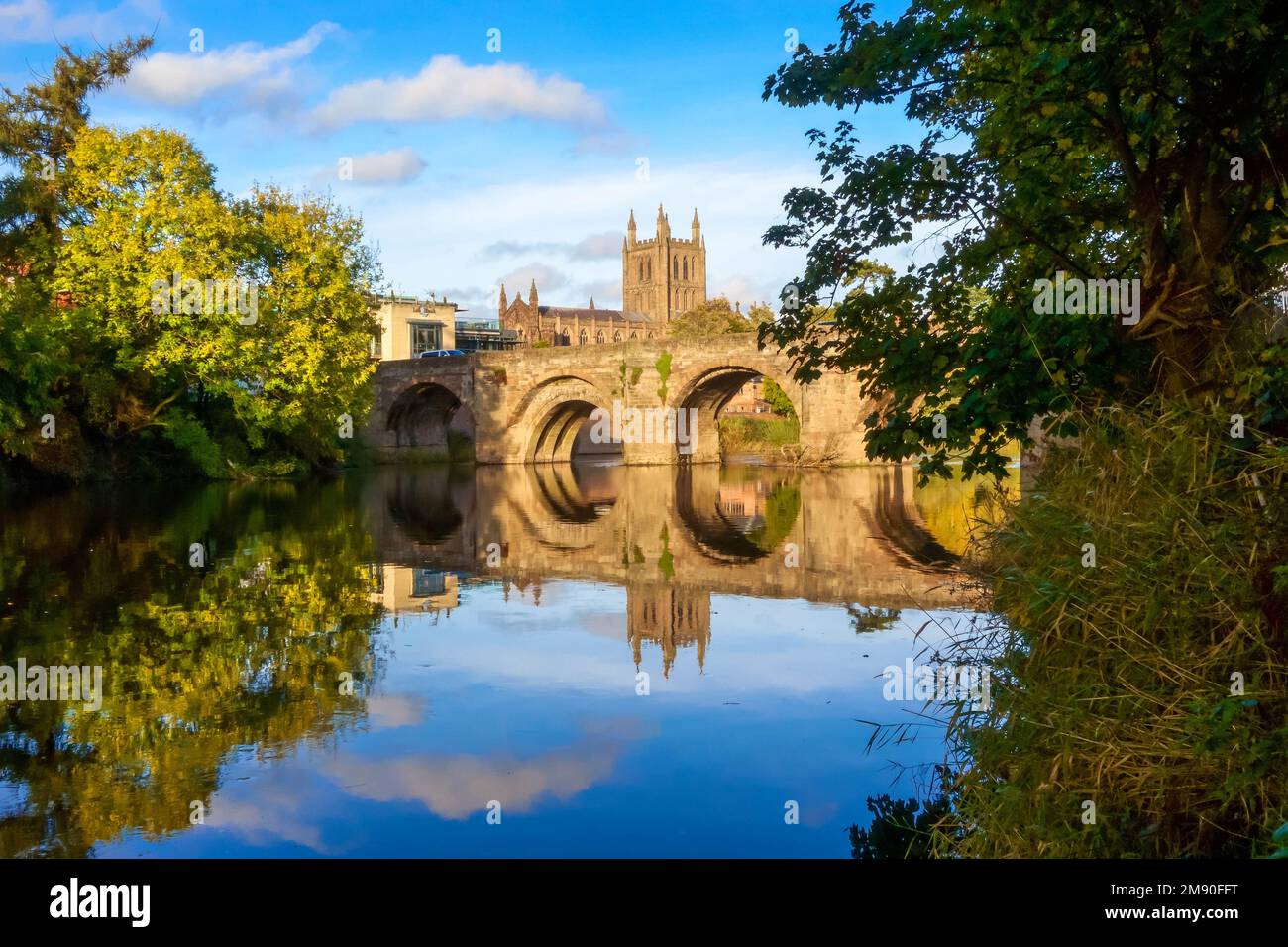 The Old Bridge constructed in 1490 spanning the river Wye at Hereford, with the 11th century Cathedral in the backgroung. Herefordshire UK. October 20 Stock Photo