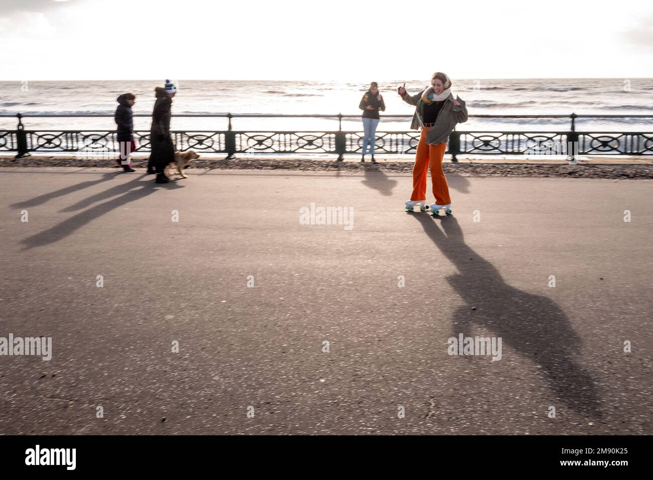 Brighton, January 15th 2023 A rollerskater on Hove seafront Stock