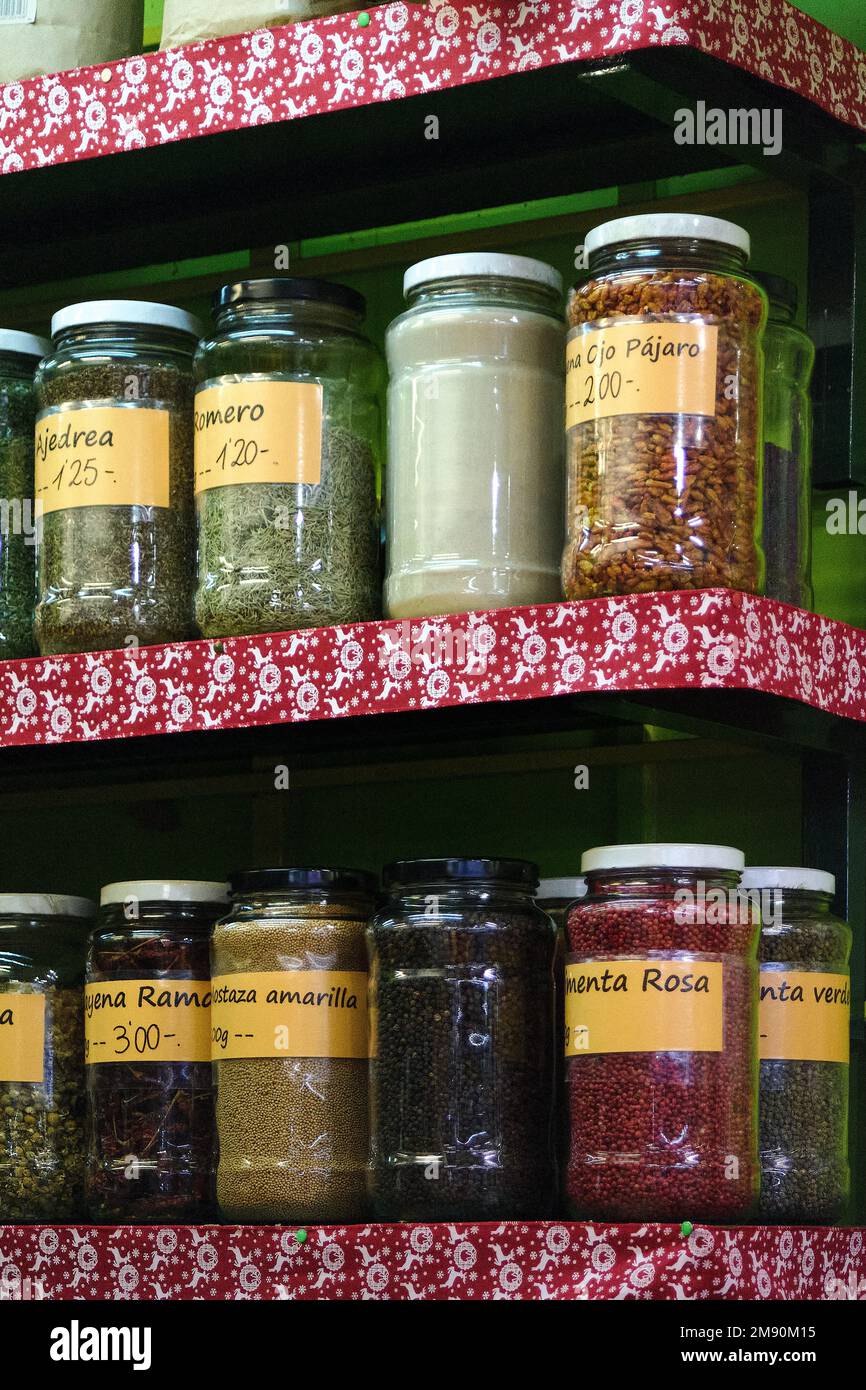 Spices on a shelf in the pantry with the name that identifies them