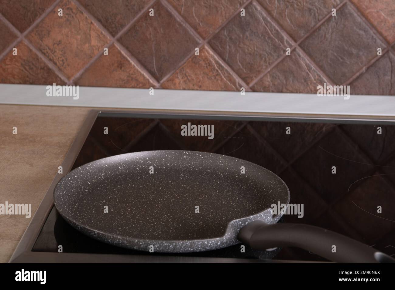 photo of an empty frying pan in the kitchen Stock Photo