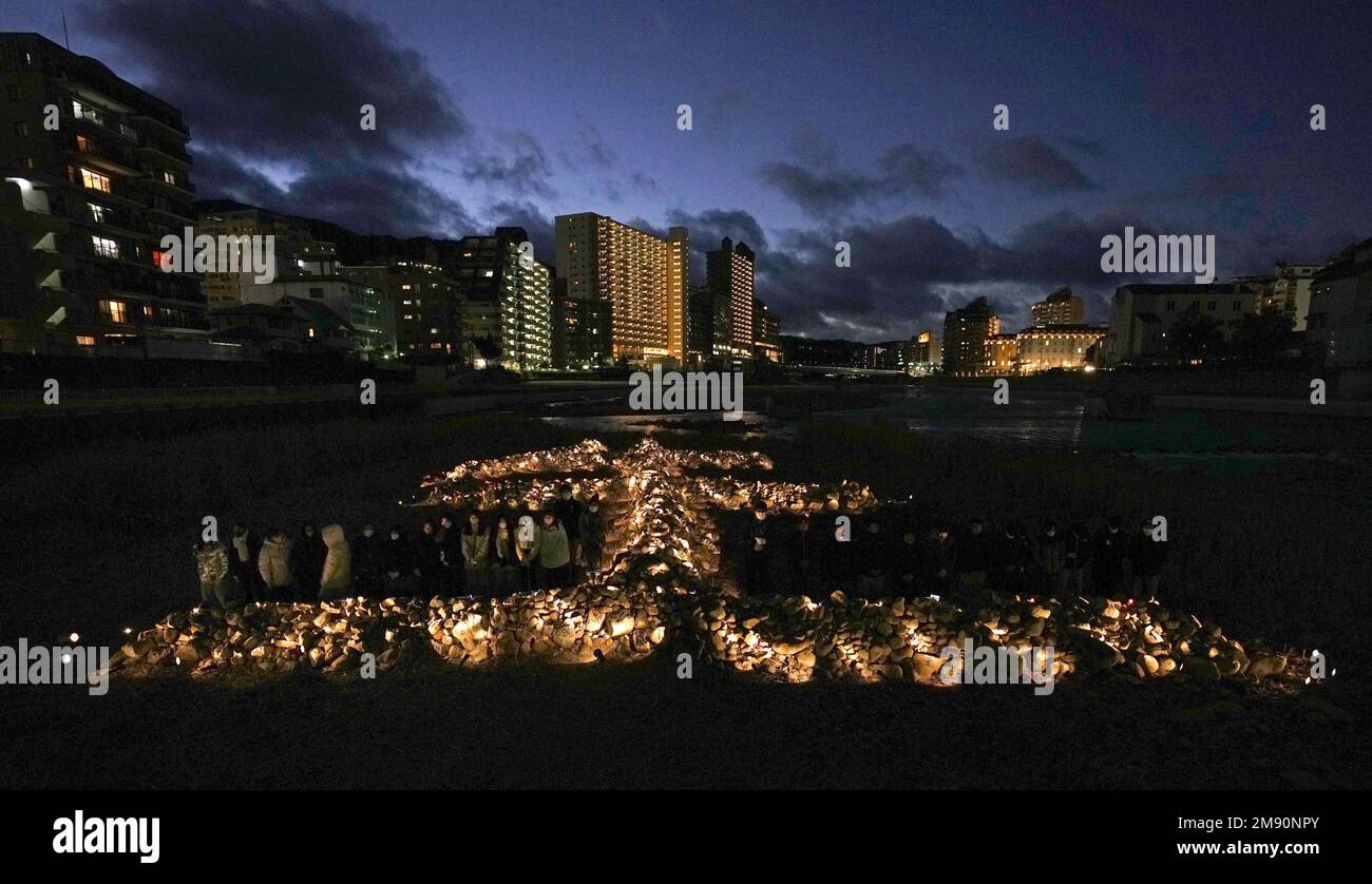 Itami, Hyogo Prefecture, Japan. 16 January, 2023. Photo taken on Jan. 16, 2023, shows stacked stones arranged to spell out the kanji for "life" lit up near a river in Takarazuka, Hyogo Prefecture, during an event marking the 28th anniversary of the Great Hanshin Earthquake, which struck the western Japan city of Kobe and its vicinity killing more than 6,000 people. (Kyodo)==Kyodo Photo via Credit: Newscom/Alamy Live News Credit: Newscom/Alamy Live News Stock Photo