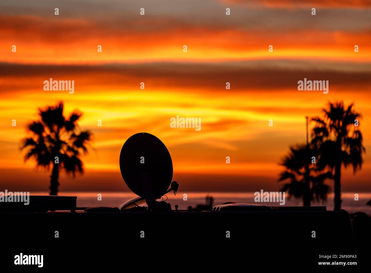 camper van satellite dish against sunset Stock Photo Alamy