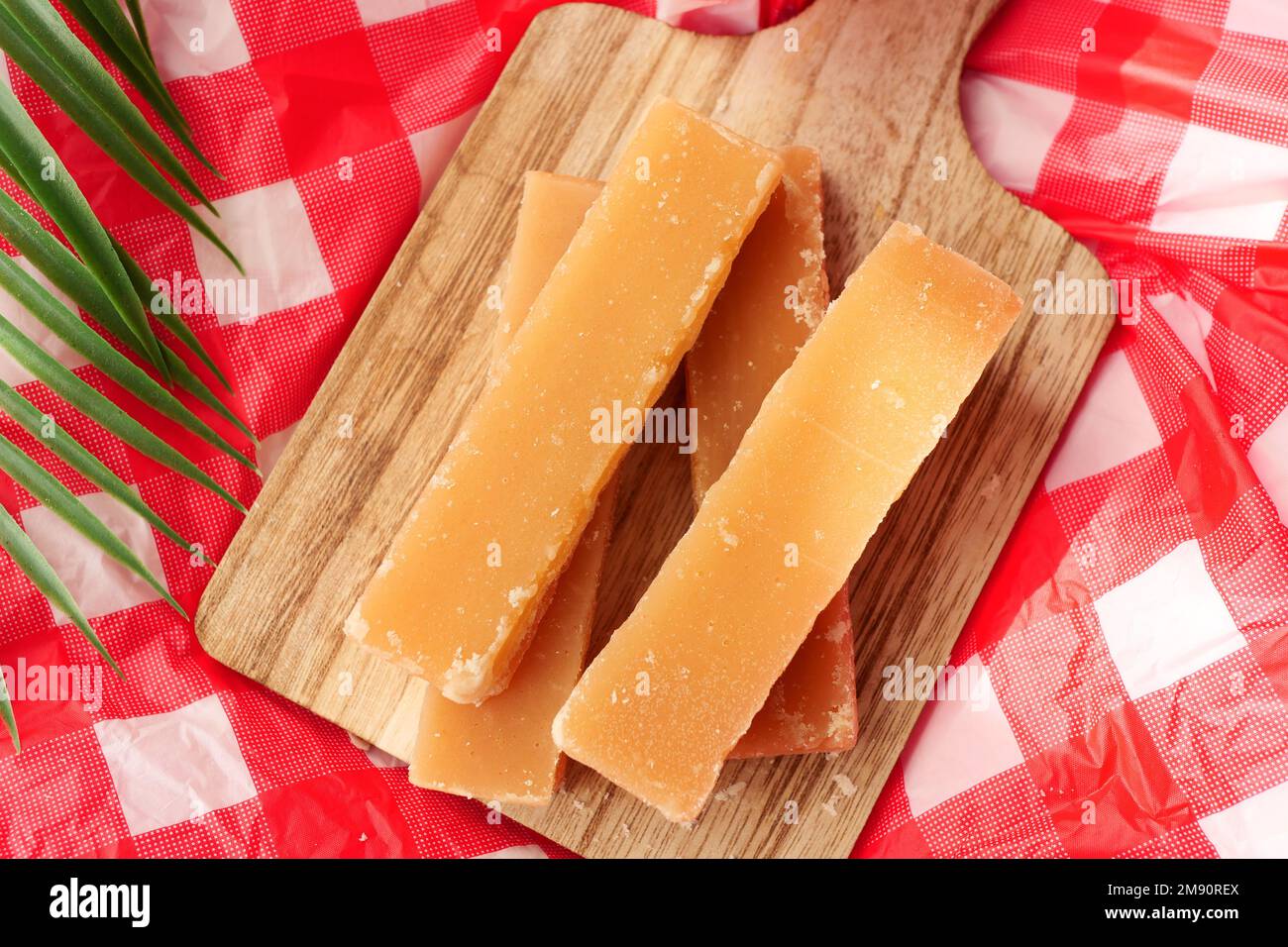 Jaggery traditional cane sugar cube on table  Stock Photo