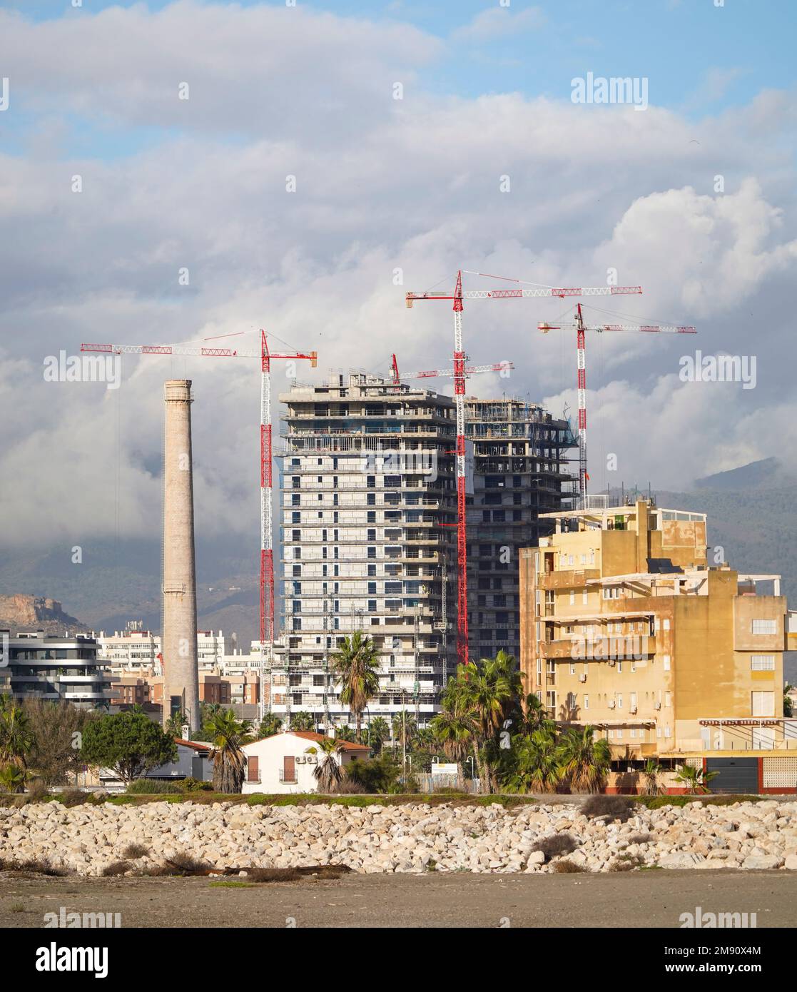 High-rise buildings, tower block, surrounded by cranes in Malaga under construction, Malaga, Costa del sol, Spain. Stock Photo