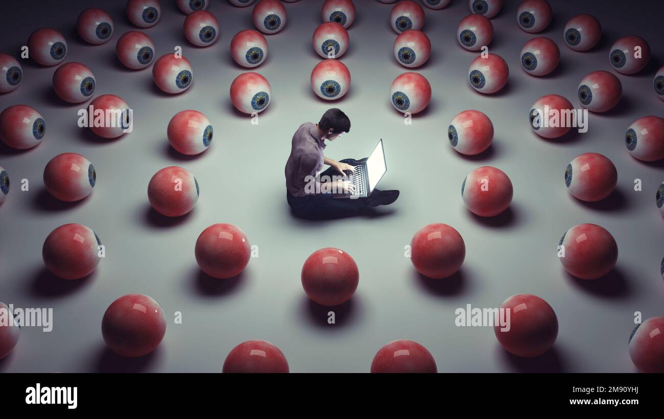 Man working on laptop while eyes are watching . Social media reach and