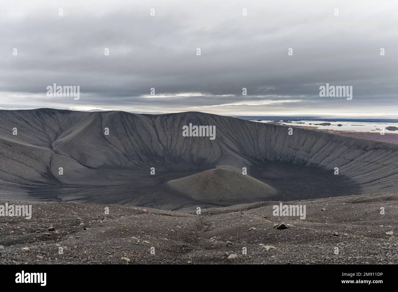 Lava Mountain in Iceland. Path around with hole in the middle. Hverfell, Hverfjall Stock Photo