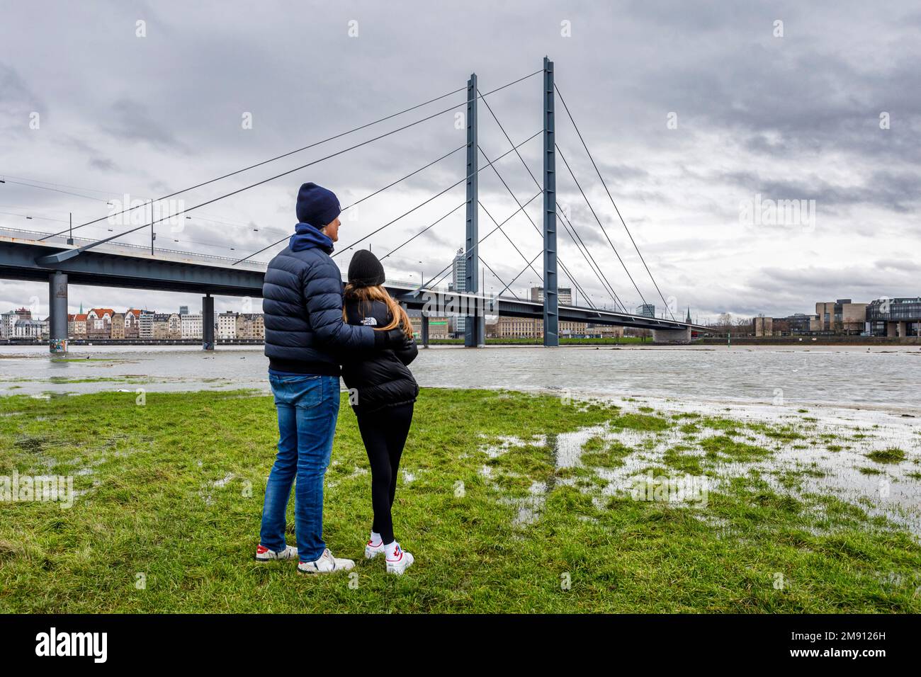 Rising water level on the Rhine in Düsseldorf, plus rain and stormy weather, view of the Rheinkniebrücke, old town, state parliament Stock Photo