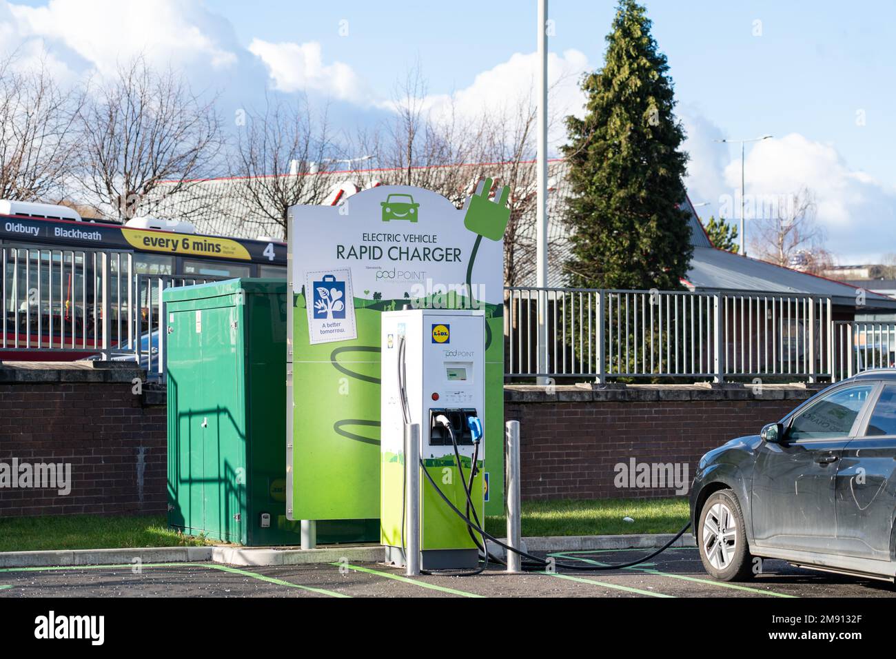Lidl Pod Point branded Electric Vehicle charging point in the Merry Hill shopping centre in Brierley Hill, UK Stock Photo