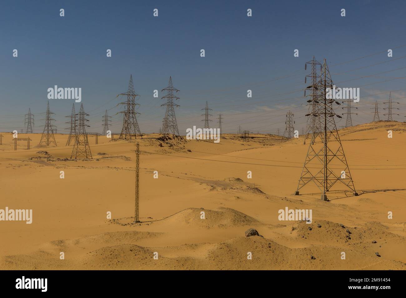 Electric pylons in a desert near Aswan, Egypt Stock Photo Alamy