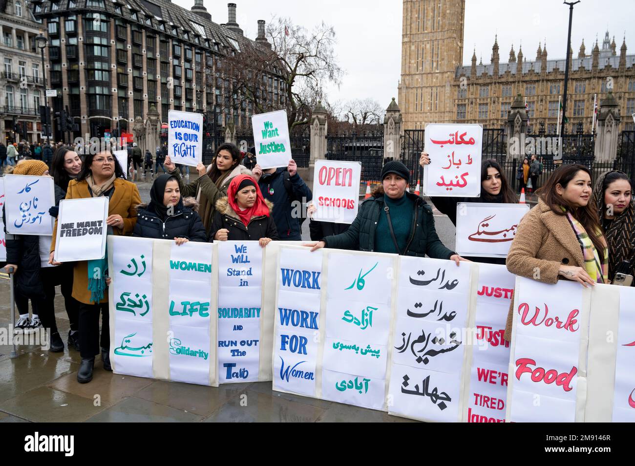 On January 14th 2023 a group of Afghan women demonstrate in Parliament Square demanding education and freedom for women in Afghanistan. Stock Photo