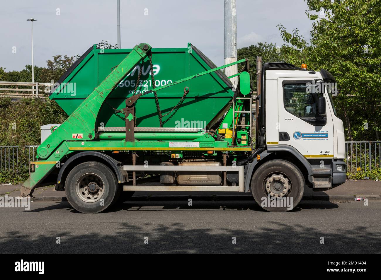 An Enva skip on the back of a lorry parked at the roadside, Glasgow