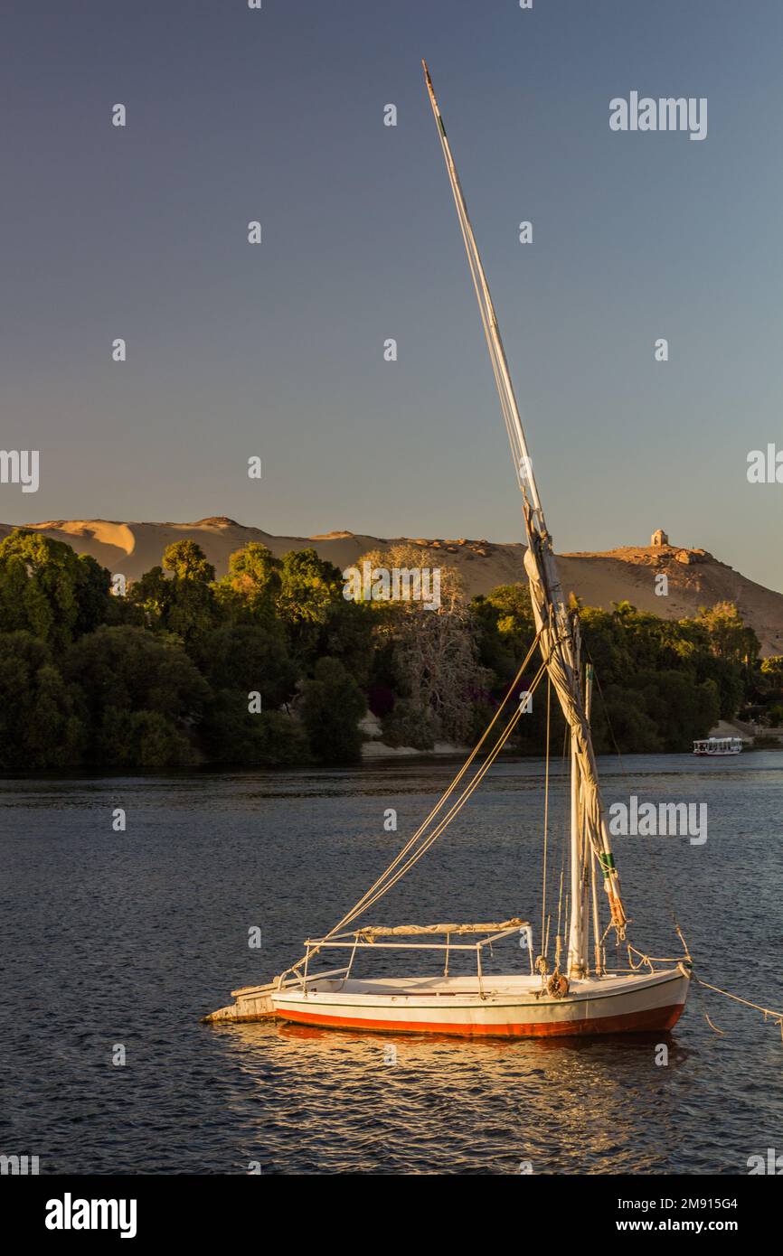 Felucca sail boat at the river Nile in Aswan, Egypt Stock Photo - Alamy