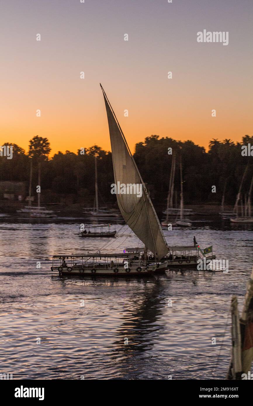 Felucca sail boats at the river Nile in Aswan, Egypt Stock Photo - Alamy