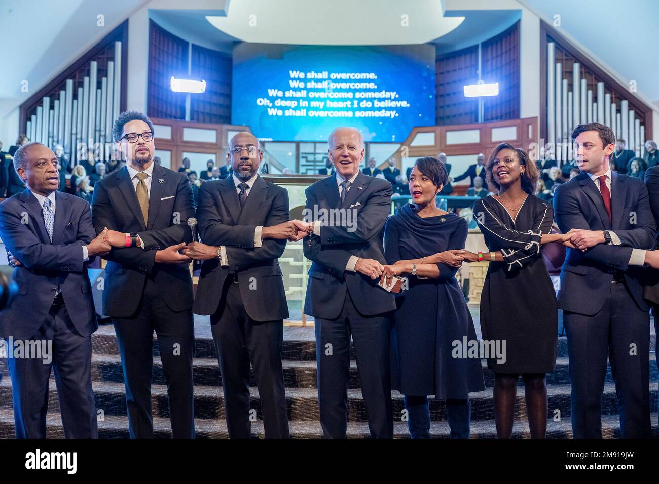 Atlanta, United States Of America. 15th Jan, 2023. Atlanta, United States of America. 15 January, 2023. U.S President Joe Biden, center, clasps hands and sings with Senator Raphael Warnock, center left, and former Atlanta Mayor Keisha Lance Bottoms, center right, during a celebration of Martin Luther King Jr. Day at Ebenezer Baptist Church, January 15, 2023 in Atlanta, Georgia. Biden is the first sitting president to delivered a sermon at the church where Martin Luther King Jr. was a pastor. Credit: Adam Schultz/White House Photo/Alamy Live News Stock Photo