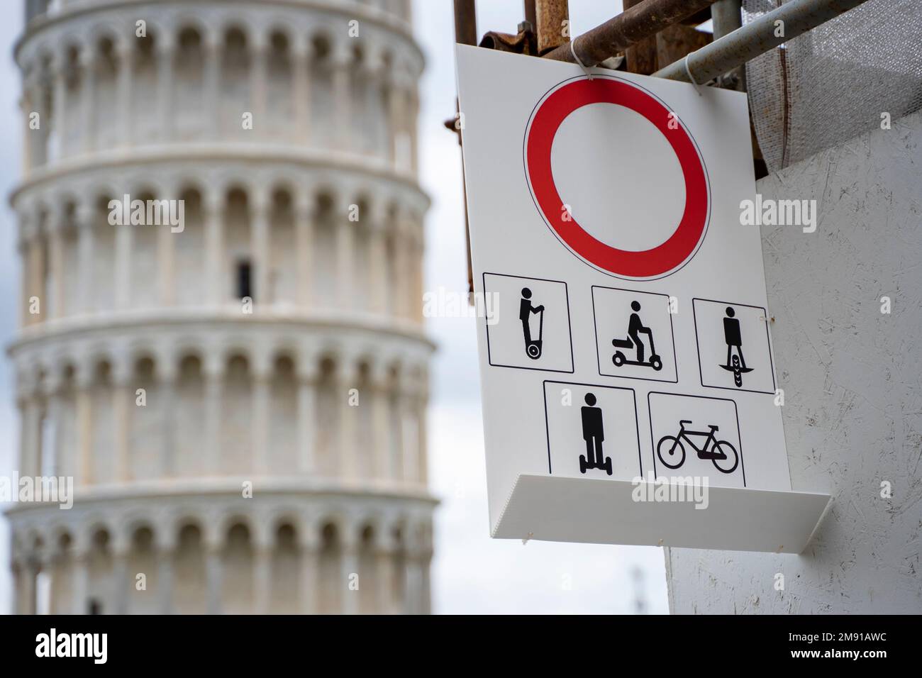 Tourist Sign in front of the Tower of Pisa, Italy Stock Photo