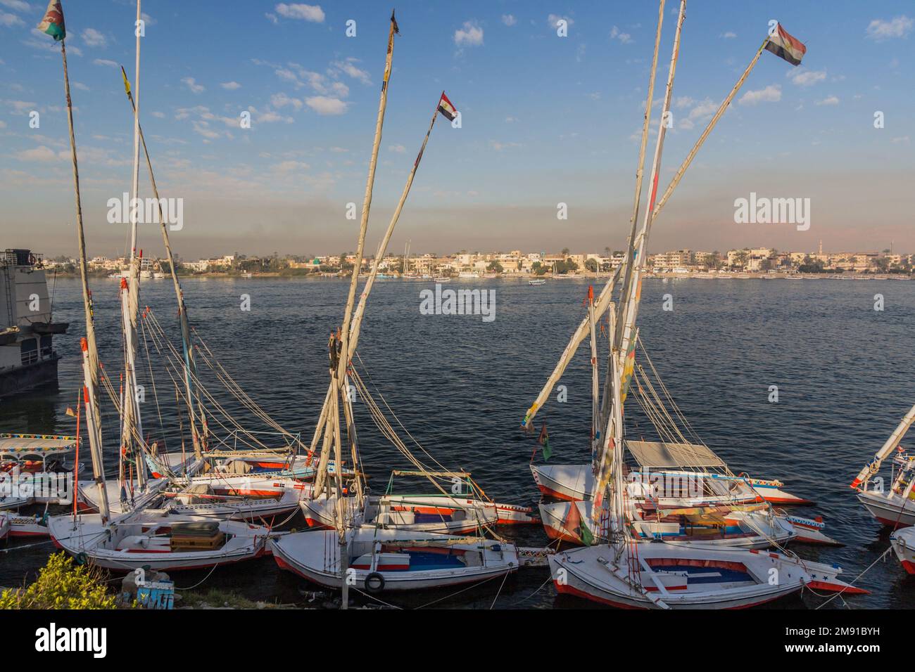 Felucca sail boats at the Nile river in Luxor, Egypt Stock Photo - Alamy