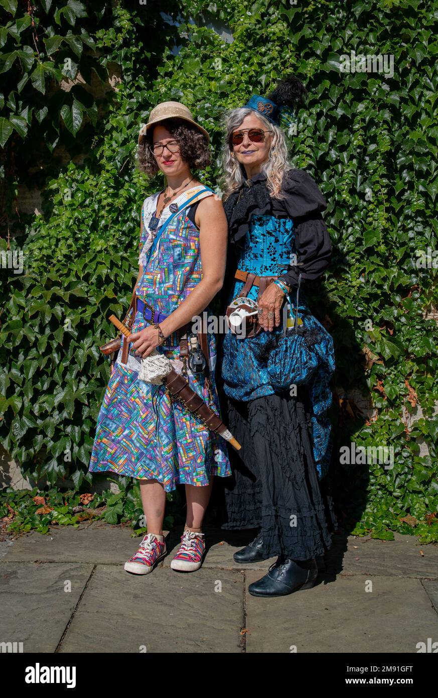 Premium Photo  Two women wearing steampunk clothing, one wearing
